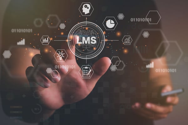 vecteezy_man-hand-touching-virtual-screen-to-lms-learning_5526858_167 (1)